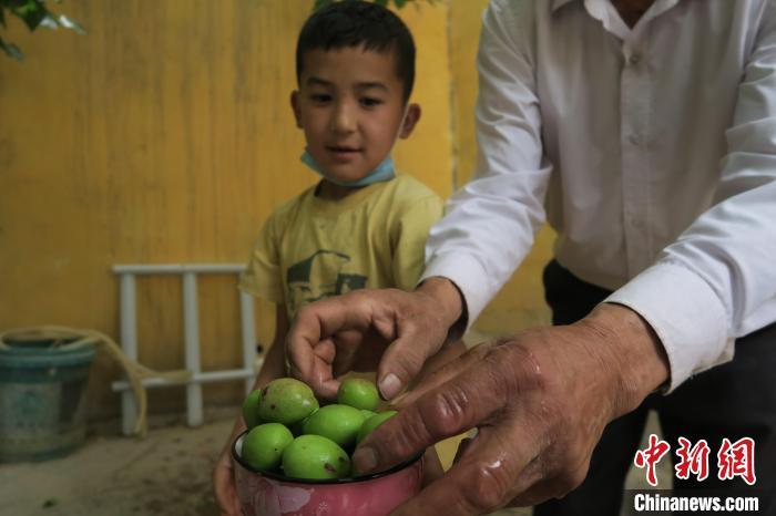 圖為進(jìn)藏先遣英雄連誓師地原址所在的新疆維吾爾自治區(qū)和田地區(qū)于田縣普魯村現(xiàn)貌?！畛坛?攝